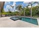 Stunning pool and spa surrounded by lush landscaping at 1718 Prospect St, Sarasota, FL 34239