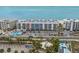 Aerial view of beachfront condo building showcasing its location at 19610 Gulf Blvd # 303, Indian Shores, FL 33785