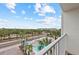 Balcony offering pool and partial ocean view at 19610 Gulf Blvd # 303, Indian Shores, FL 33785