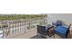 Relaxing balcony with outdoor furniture and ocean view at 19610 Gulf Blvd # 303, Indian Shores, FL 33785