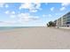 Expansive beach with white sand and blue sky at 19610 Gulf Blvd # 303, Indian Shores, FL 33785