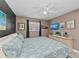 Comfortable bedroom featuring a king-size bed and plenty of light at 19610 Gulf Blvd # 303, Indian Shores, FL 33785