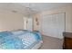 Comfortable bedroom with double bed, built-in closet and ceiling fan at 1981 Bayshore Dr, Englewood, FL 34223