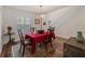 Bright dining room with hardwood floors and a chandelier at 1981 Bayshore Dr, Englewood, FL 34223