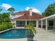 Resort-style pool with spa and outdoor patio at 1981 Bayshore Dr, Englewood, FL 34223