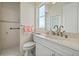 Clean bathroom with walk-in shower, toilet and modern vanity at 210 Beeney Se Rd, Port Charlotte, FL 33952