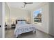 Guest bedroom with full-size bed and large window at 210 Beeney Se Rd, Port Charlotte, FL 33952