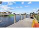 Concrete boat dock offering canal access at 210 Beeney Se Rd, Port Charlotte, FL 33952