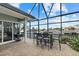 Covered patio with seating area and stunning canal views at 210 Beeney Se Rd, Port Charlotte, FL 33952