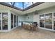 Outdoor kitchen with seating area and grill at 210 Beeney Se Rd, Port Charlotte, FL 33952