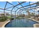 Enclosed pool and spa with water view at 210 Beeney Se Rd, Port Charlotte, FL 33952