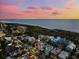 Two story house at sunset by the ocean at 221 Tenacity Ln, Sarasota, FL 34242