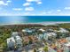 Aerial view of beach house with oceanfront location at 221 Tenacity Ln, Sarasota, FL 34242