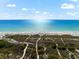 Expansive beach with clear water and blue sky at 221 Tenacity Ln, Sarasota, FL 34242