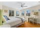 Bedroom with hardwood floors and ocean views at 221 Tenacity Ln, Sarasota, FL 34242