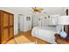 Bedroom with hardwood floors and access to bathroom at 221 Tenacity Ln, Sarasota, FL 34242