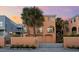 Exterior view of a beach home with a two-car garage at 221 Tenacity Ln, Sarasota, FL 34242