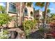 Landscaped walkway leading to beach home entrance at 221 Tenacity Ln, Sarasota, FL 34242