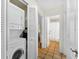 Convenient laundry closet with stacked washer and dryer at 221 Tenacity Ln, Sarasota, FL 34242