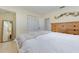 Bedroom with a white metal bed frame and dresser at 2338 Lynn St, Sarasota, FL 34231