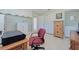 Bedroom with a desk, chair, and built-in storage at 2338 Lynn St, Sarasota, FL 34231