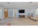 Living room with hardwood floors and a view into the hallway at 2338 Lynn St, Sarasota, FL 34231