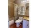 Clean bathroom, bathtub, toilet and granite vanity at 2636 Hidden Lake N Dr # G, Sarasota, FL 34237