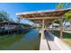 Covered boat slips and canal access at 315 Palm Grove Ave, Englewood, FL 34223