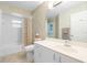 Bathroom with tub, toilet, and vanity at 3298 Branch Creek Dr, Sarasota, FL 34235