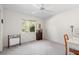 Bedroom with desk, window, and closet at 3298 Branch Creek Dr, Sarasota, FL 34235