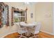 Charming breakfast nook with table and four chairs at 3298 Branch Creek Dr, Sarasota, FL 34235