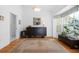 Bright dining area with hardwood floors and bay window at 3298 Branch Creek Dr, Sarasota, FL 34235