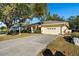 House exterior with driveway and landscaping at 3298 Branch Creek Dr, Sarasota, FL 34235