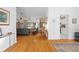 Living room with hardwood floors and view into kitchen area at 3298 Branch Creek Dr, Sarasota, FL 34235