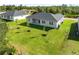 Aerial view of house backyard and surrounding landscape at 3411 Dryden St, North Port, FL 34288