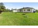 Spacious backyard with grassy area at 3411 Dryden St, North Port, FL 34288