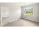 Light-filled dining room with view to backyard at 3411 Dryden St, North Port, FL 34288