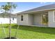 Covered patio with sliding glass doors at 3411 Dryden St, North Port, FL 34288