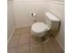 Clean bathroom featuring a toilet and tiled floor at 3411 Spanish Oak Ter, Sarasota, FL 34237