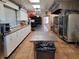 Large commercial kitchen with stainless steel counters and ample storage at 3411 Spanish Oak Ter, Sarasota, FL 34237