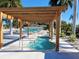 Relaxing community hot tub under pergola at 3411 Spanish Oak Ter, Sarasota, FL 34237