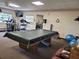 Recreation room with a pool table and exercise balls at 3411 Spanish Oak Ter, Sarasota, FL 34237