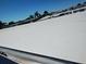 White single-wide manufactured home roof at 3411 Spanish Oak Ter, Sarasota, FL 34237