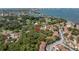 Wider aerial view showing property's waterfront proximity at 3640 41St S Ln # F, St Petersburg, FL 33711