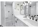 Bright bathroom boasts double vanity and stylish fixtures at 3640 41St S Ln # F, St Petersburg, FL 33711