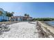 Private beach access with white sand and waterfront views at 3640 41St S Ln # F, St Petersburg, FL 33711