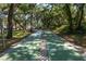 Shuffleboard court nestled among trees at 3640 41St S Ln # F, St Petersburg, FL 33711