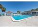 Community pool with gazebo and waterfront views at 3640 41St S Ln # F, St Petersburg, FL 33711