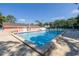 Community swimming pool with ample deck space at 3640 41St S Ln # F, St Petersburg, FL 33711