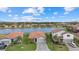 Community overview featuring lakefront homes and lush landscaping at 3713 Savanna Palms Ct, Bradenton, FL 34211